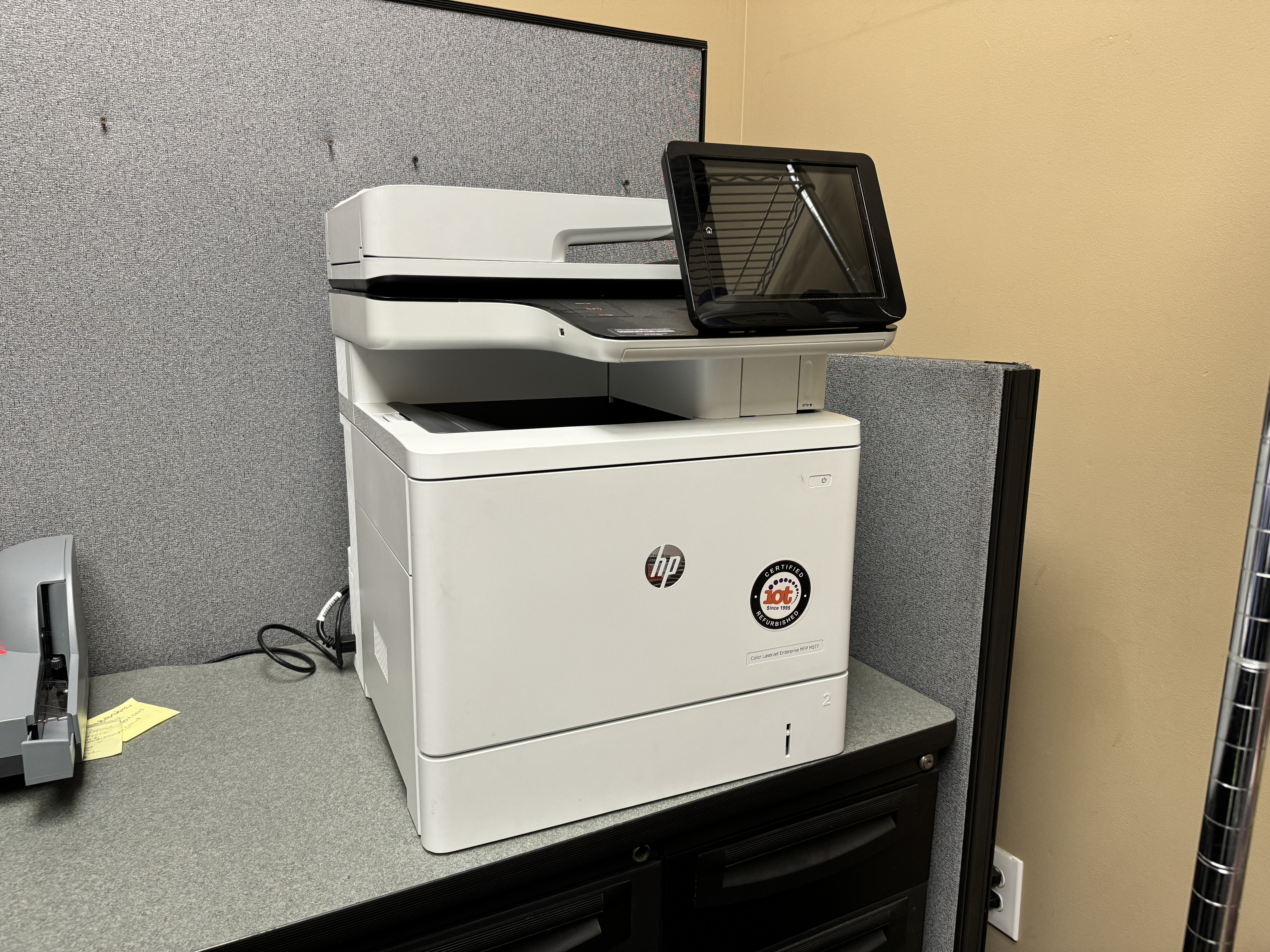 HP M577 Color Copier used in a typical IOT used copier lease. 