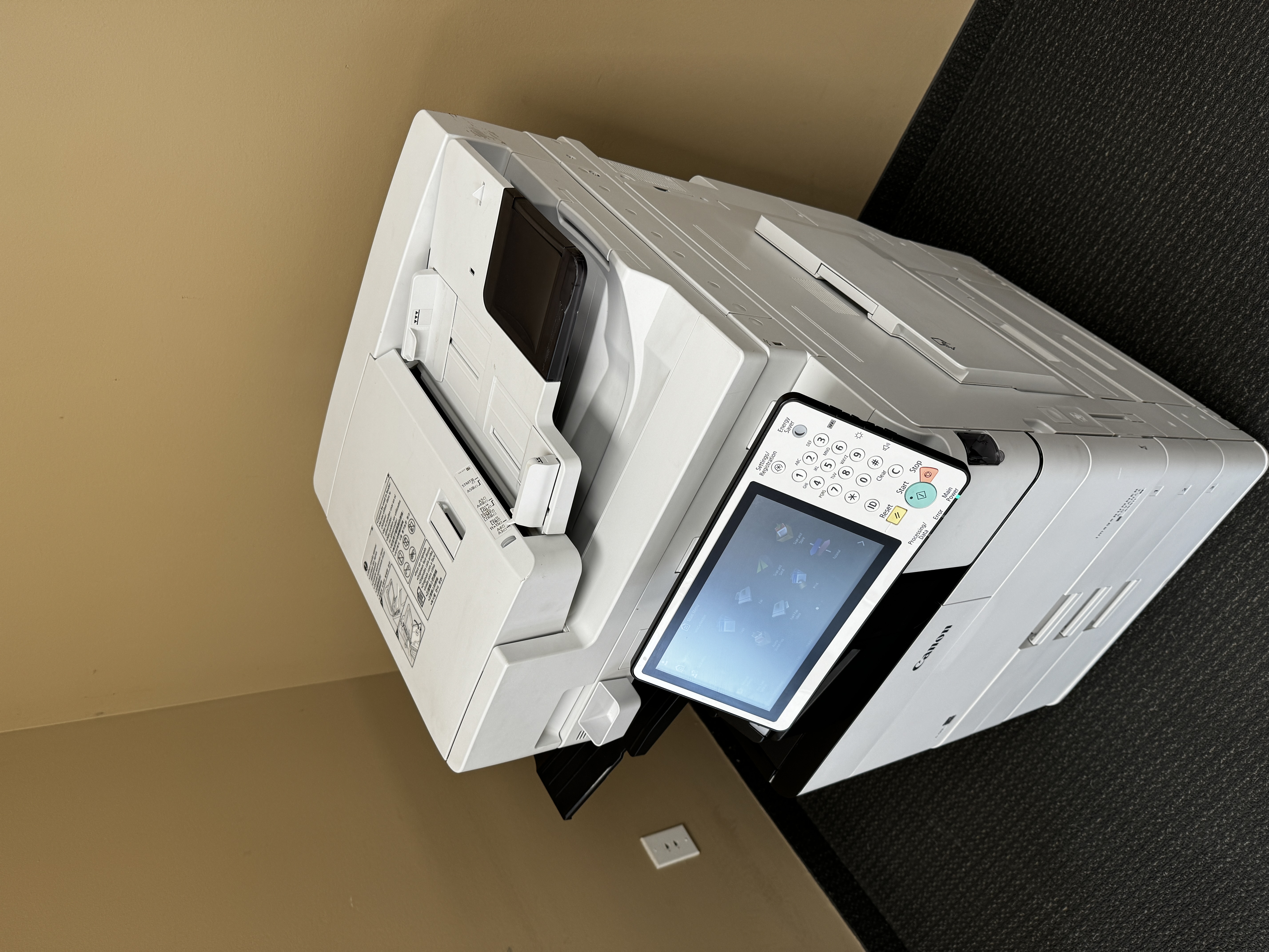 Copier repair service of a Canon Imagerunner Advance C5550ii.