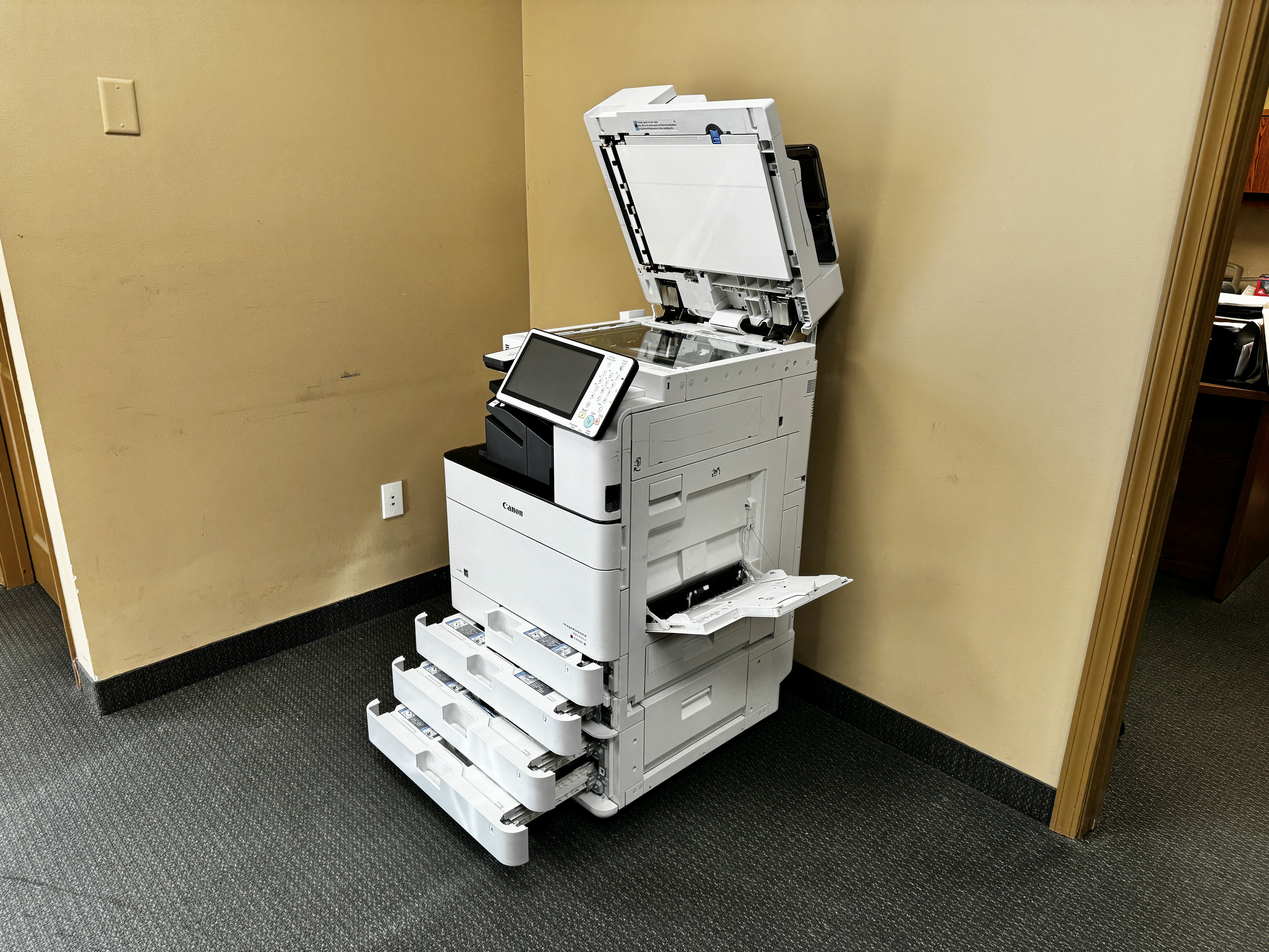 Copier repair service of a Canon Imagerunner advance C5550ii.