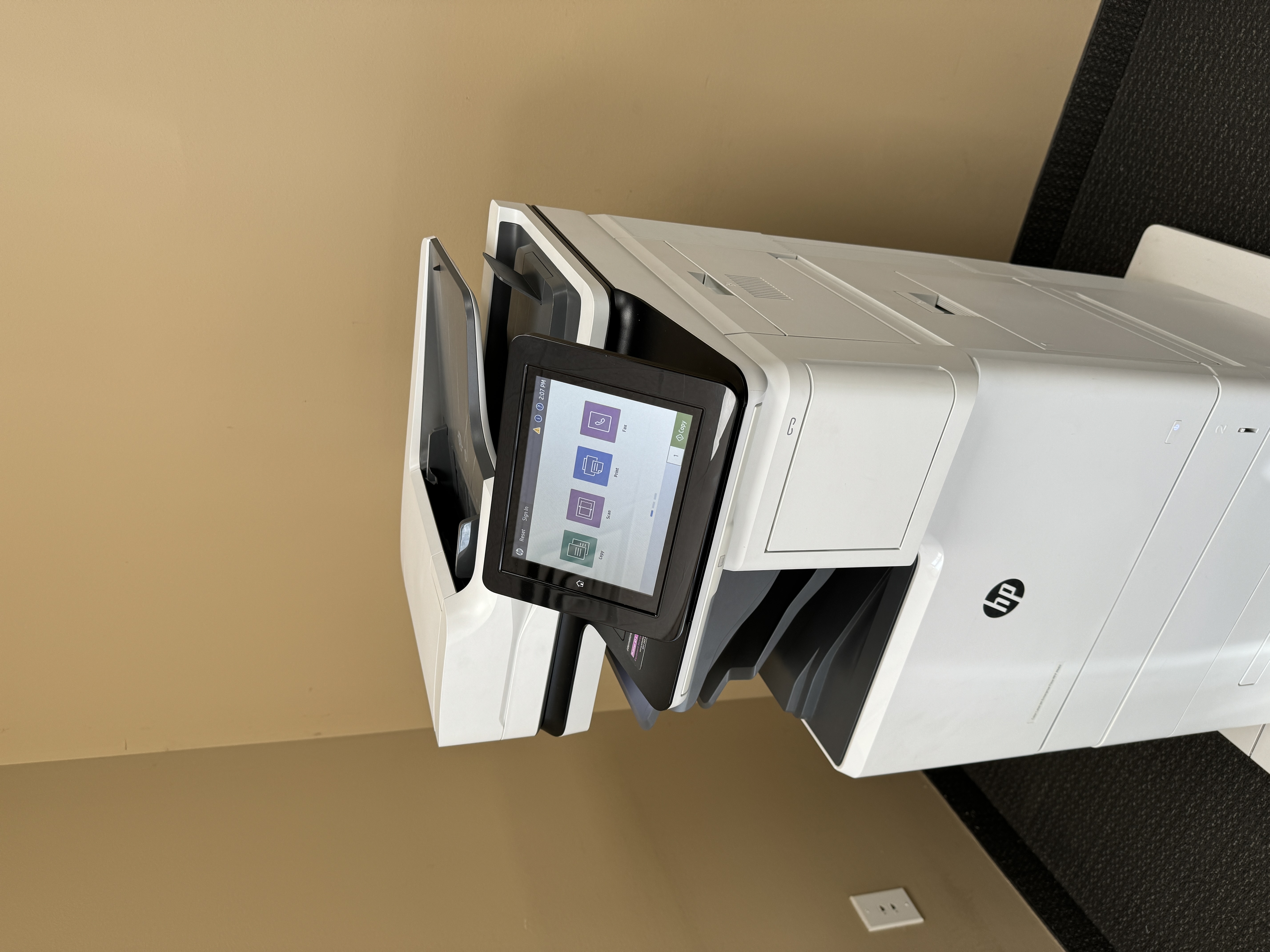 Copier services on a HP M682 color copier.