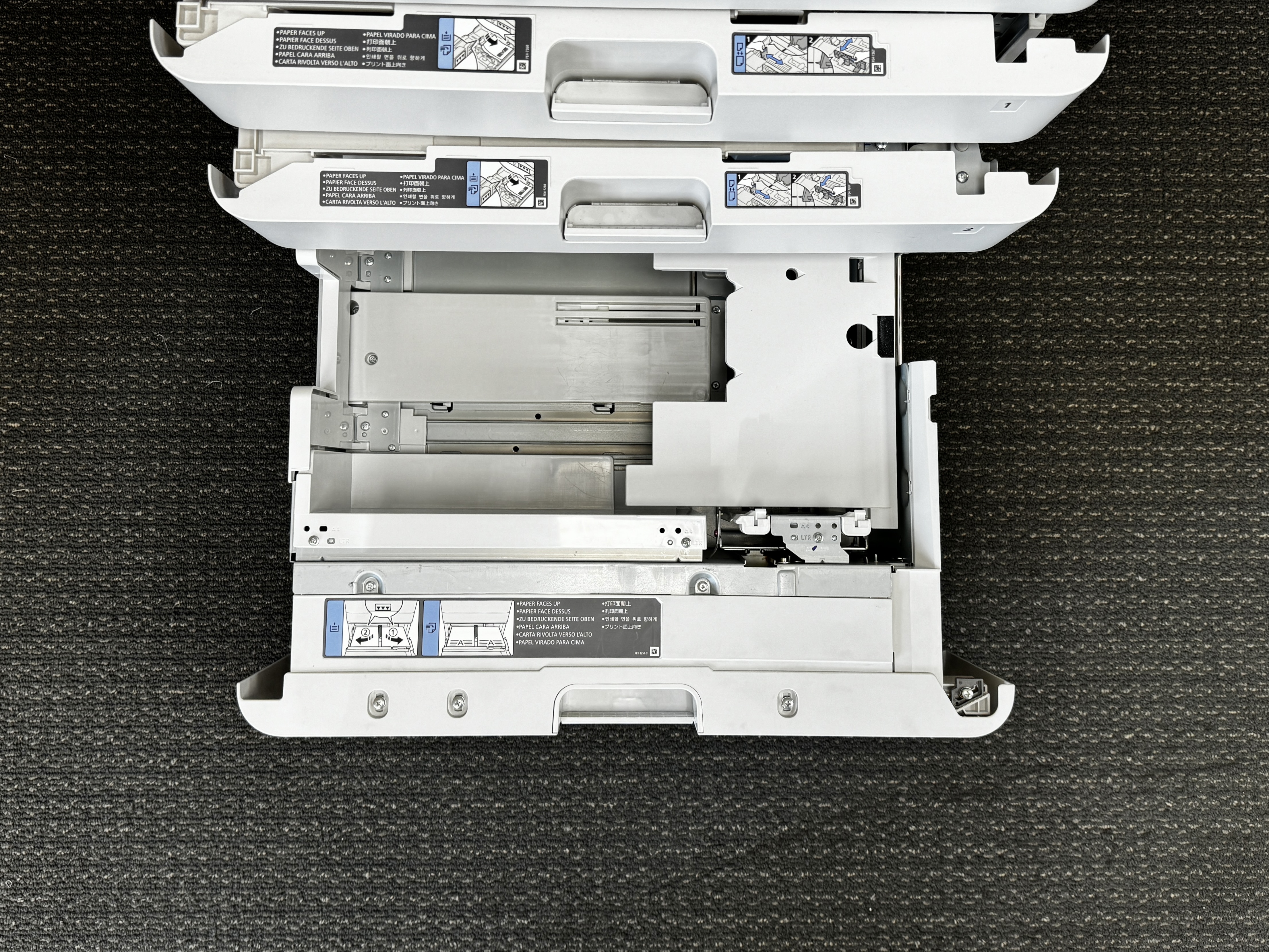 Paper tray for a Canon black and white copiers.