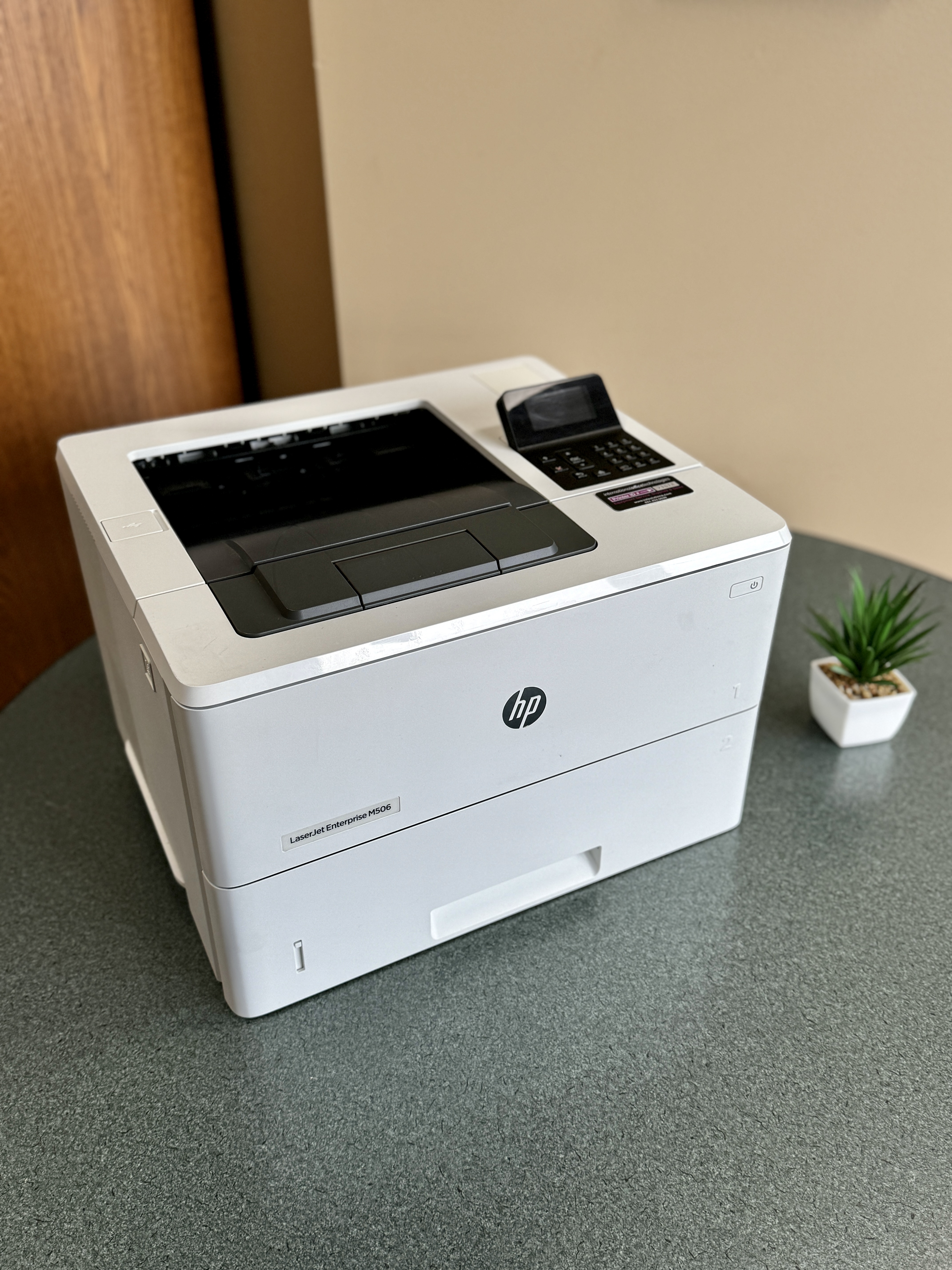 Black and white desktop printer. HP M506.