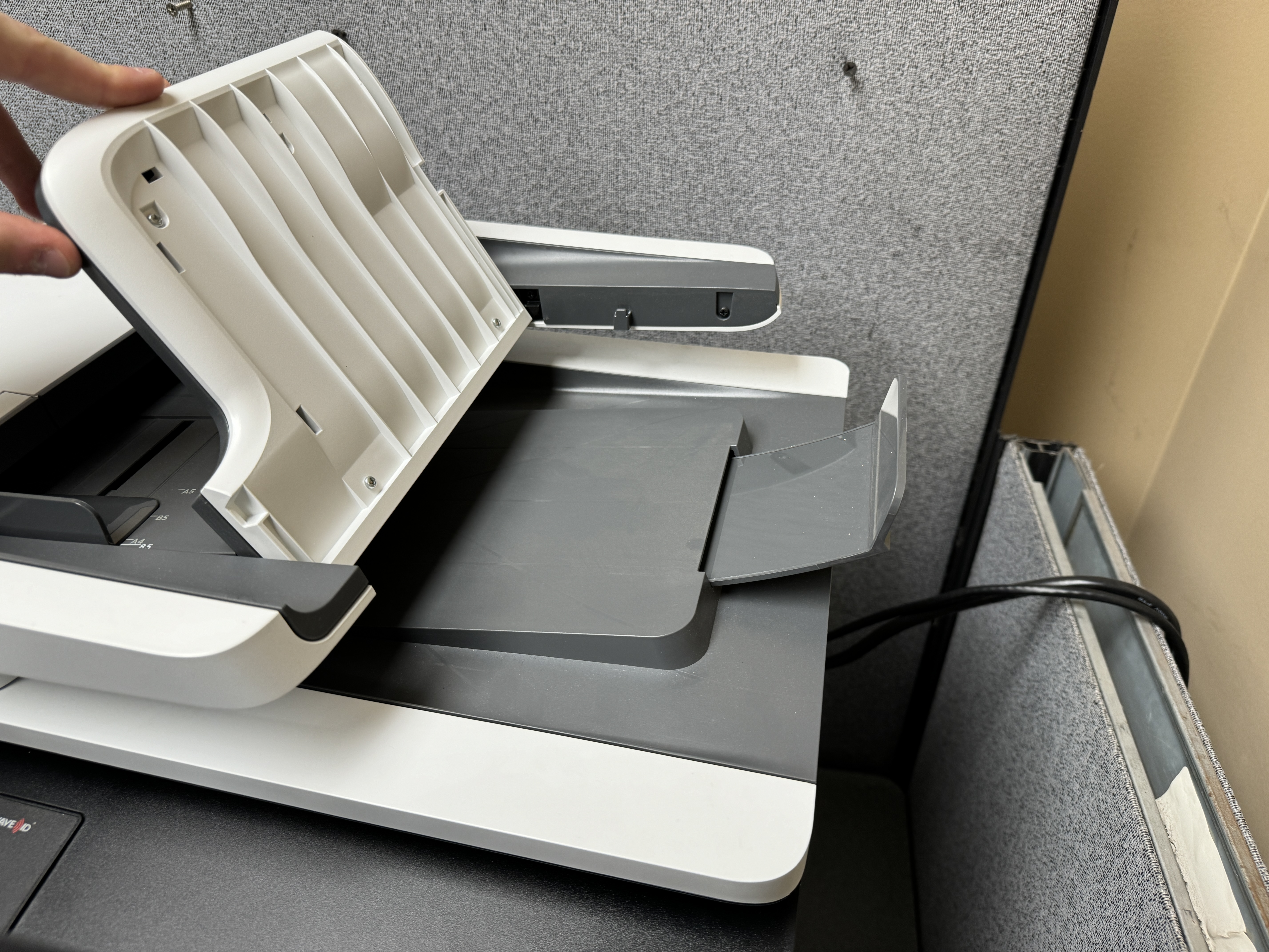 ADF flap for a HP M577 mfp color printer.